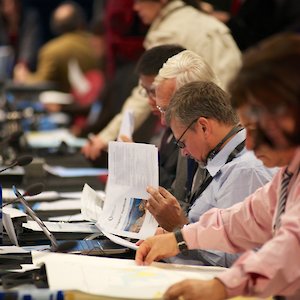 Delegates at the Antarctic Treaty Consultative Meeting in Hobart, 2012 (Photo: Glenn Jacobson) Delegates at table reading papers
