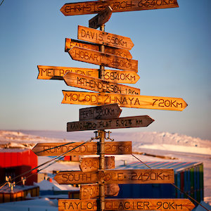 Mawson fingerpost sign (Photo: Chris Wilson) The Mawson fingerpost sign indicating distances to a range of locations including Hobart, Adelaide, South Pole and the other Australian Antarctic stations.