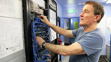 Man working on servers.