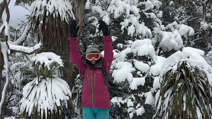 A person standing on skis in the snow